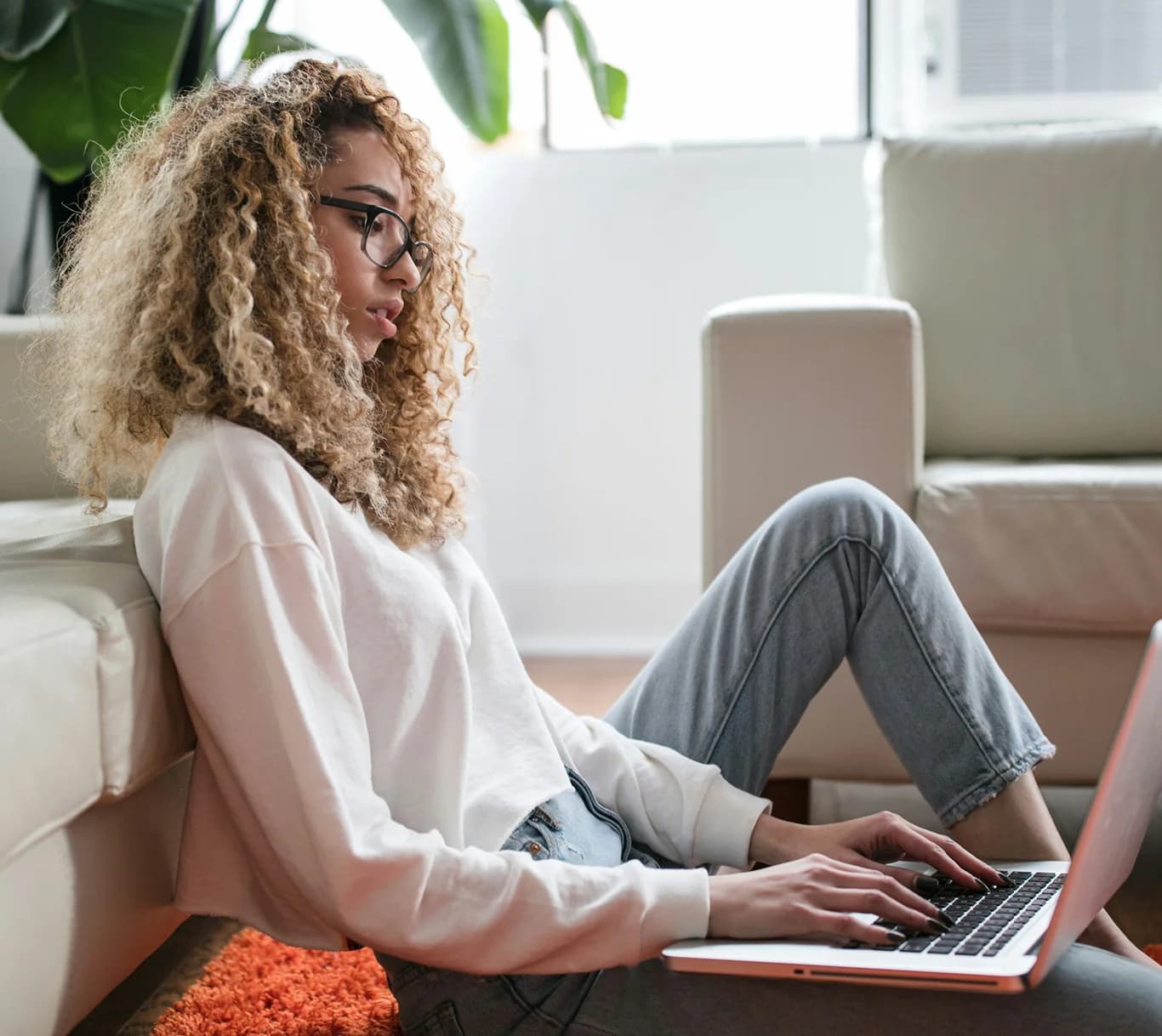 Woman using laptop.